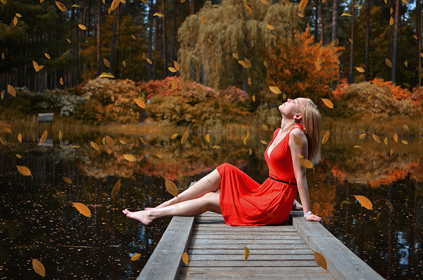 坐在湖边闭目养神的红衣少女