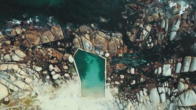 海边礁石中的游泳池航拍短视频素材【4K】